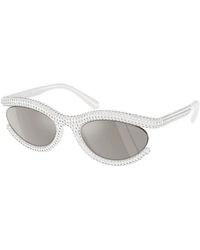 Swarovski - Stilvolle sonnenbrille für moderne frauen - Lyst
