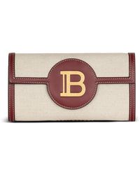 Balmain - B-buzz canvas and leather wallet - Lyst