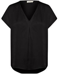 Soaked In Luxury - Schwarzes Top Mit V-Ausschnitt Und Kurzen Ärmeln - Lyst