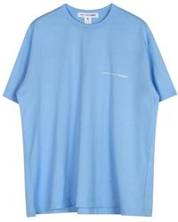 Comme des Garçons - Tops ,Blauw ,Katoen Blauw Logo Katoenen T-Shirt Met Korte Mouwen - Lyst