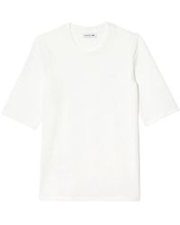 Lacoste - T-shirt e polo bianchi - Lyst