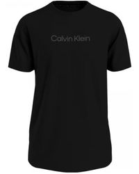 Calvin Klein - Tops ,Zwart ,Katoen Logo T-Shirt Met Ronde Hals - Lyst
