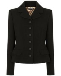 Dolce & Gabbana - Chaqueta de lana negra con cierre de botón simple e interior de leopardo - Lyst