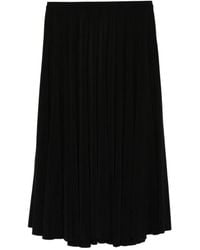 Norma Kamali - Zwarte Geplooide A-Lijn Rok - Lyst