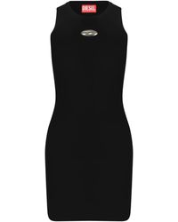 DIESEL - Kleedjes ,Zwart ,Polyester Zwarte Mouwloze Geribbelde Jurk Met Metalen Logo - Lyst