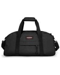 Eastpak - Faltbare reisetasche mit taschen - Lyst