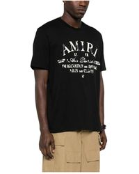 Amiri - T-shirt e polo nere con logo flockato - Lyst