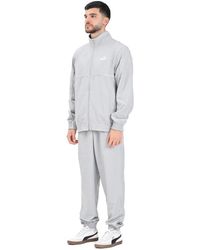 PUMA - Fitness ,Grijs ,Polyester Grijze Trainingspak Jas En Broek Set - Lyst