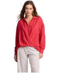 Kocca - Chique Blouse Met Gedraaide Lange Mouwen - Lyst