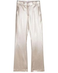 Genny - Lamé pantaloni svasati argento - Lyst
