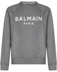 Balmain - Maglione grigio a coste con logo a contrasto - Lyst