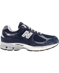 New Balance - Sneakers blu con lacci per uomo - Lyst