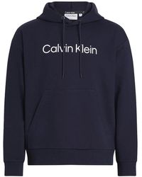Calvin Klein - Felpa blu comfort con cappuccio e logo uomo - Lyst