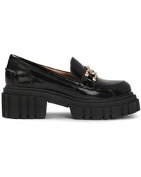 Kazar - Schwarze Flache Schuhe Mit Einer Kette Auf Einer Lug-Sohle - Lyst