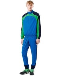 Lacoste - Fitness ,Blauw ,Polyester Stretch Tennis Trainingspak Blauw - Lyst