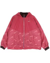 Nike - Doudoune Femme Therma Fit Icon Clash Veste A Capuche Archaeo Rose/Bronze Eclipse - Lyst