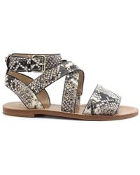 Guess - Flat Sandals - Lyst