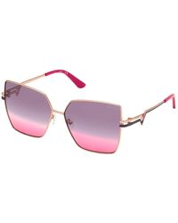 Guess - Sonnenbrille in rose gold/violet shaded - Lyst