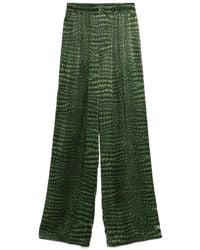 Balenciaga - Pantalones Anchos De Saten De Seda Estampados - Lyst