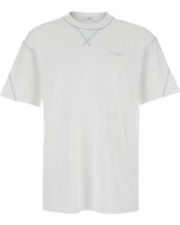 Givenchy - Tops ,Wit ,Katoen Wit T-Shirt Met Logo Op De Voorkant Van Katoen Voor - Lyst