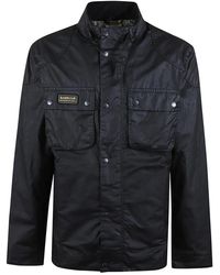 Barbour - Jassen ,Zwart ,Katoen Zwarte Gewaxte Katoenen Jas - Lyst