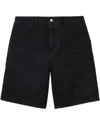Carhartt - Pantaloncini in tela nera con ginocchio singolo - Lyst