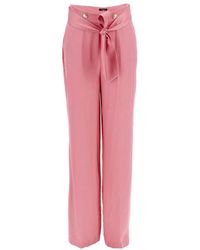 Guess - Pantalone palazzo rosa per donna - Lyst
