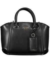 Guess - Handbags - Lyst