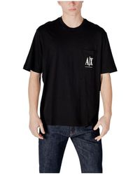 ARMANI EXCHANGE - Schwarzes baumwoll-poloshirt mit tasche - Lyst