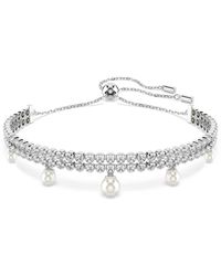 Swarovski - Braccialetto ariana grande x , crystal pearl, taglio round - Lyst