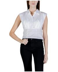 Guess - Sleeveless Tops - Lyst