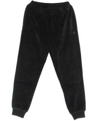Carhartt - Broeken ,Zwart ,Katoen Zwarte Joggingbroek Stijlvol Comfortabel - Lyst