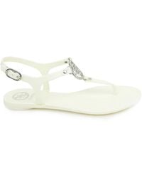 Guess - Flat Sandals - Lyst