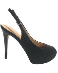 Scarpe alte con plateau e pumps da donna di Guess a partire da 65 €