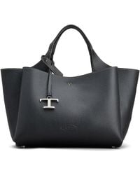 Tod's - Schwarze leder-tote-tasche mit logo-plakette - Lyst