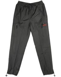 DOLLY NOIRE - Broeken ,Zwart ,Cargo Trainingsbroek Melted - Lyst