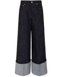 Givenchy - Raw Turn-Up Jeans - Lyst
