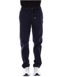 Woolrich - Pantaloni blu logo tasche laterali - Lyst