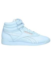 Zapatillas de corte alto Reebok de mujer: hasta el 50 % de descuento | Lyst