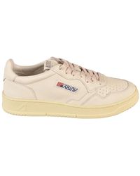 Autry - Low-profile logo-patch sneakers - Lyst