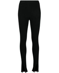 Aeron - Geribbelde Zwarte Leggings Met Voorste Split - Lyst