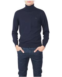 Lacoste - Truien & Vesten ,Blauw ,Wol Blauwe Wollen Coltrui - Lyst