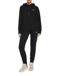 EA7 - Zwarte Sportieve Hoodie Jumpsuit - Lyst