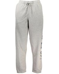 Vans - Broeken ,Grijs ,Sportieve Grijze Trainingsbroeken Met Elastische Taille - Lyst