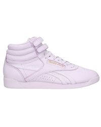 Zapatillas de corte alto Reebok de mujer: hasta el 50 % de descuento | Lyst