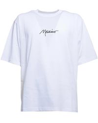 Moschino - Weißes t-shirt mit schwarzer logo-stickerei - Lyst