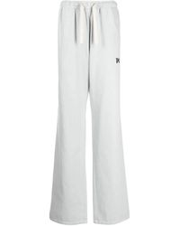 Palm Angels - Pantaloni in cotone grigi con logo ricamato - Lyst