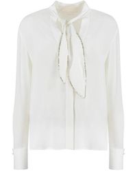 Genny - Blouses - Lyst
