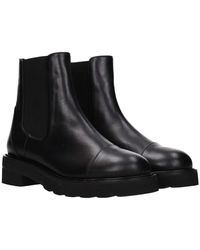 Stuart Weitzman - Schwarze Leder-Stiefeletten Mit Mittelhohen Absätzen - Lyst