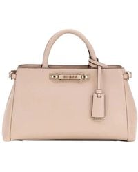 Guess - Handbags - Lyst